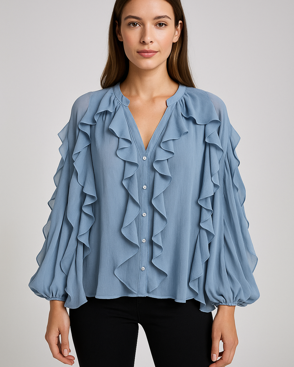 Elegant chiffonbluse med flæser og voluminøse ærmer
